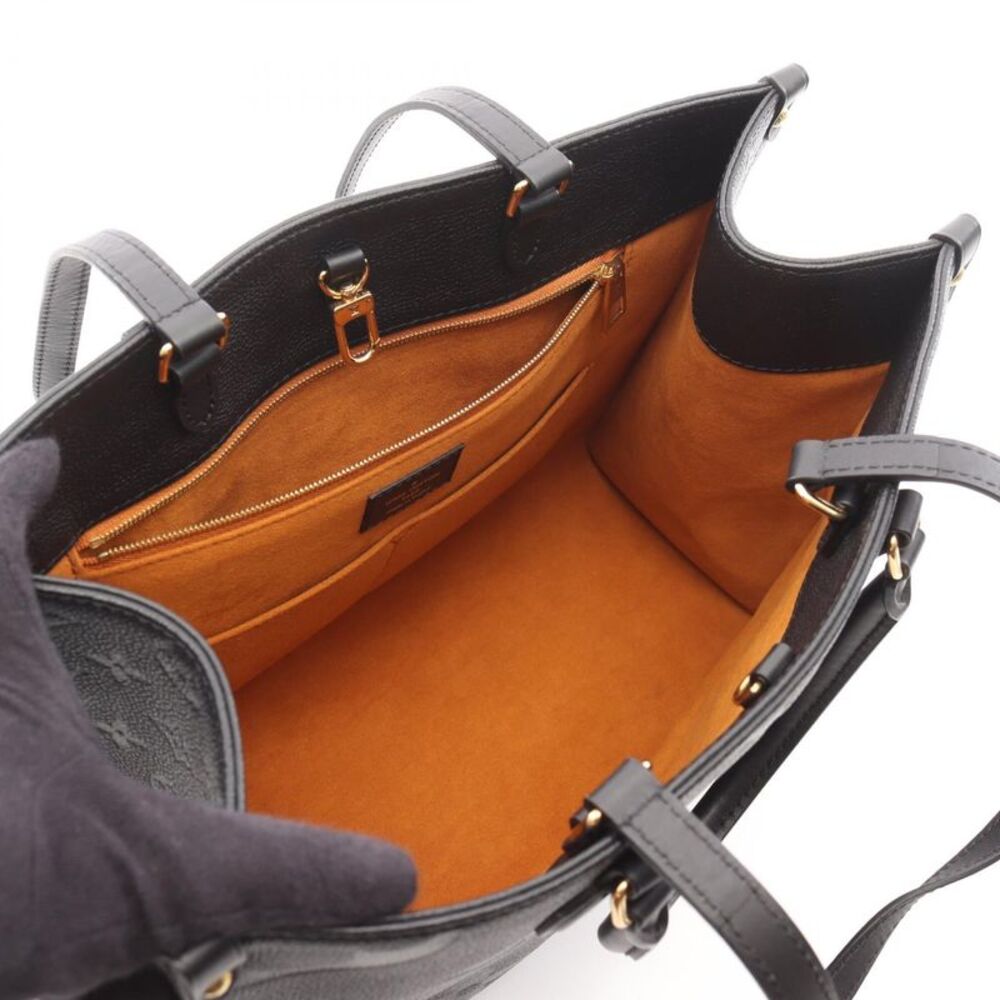 Louis Vuitton OnTheGo MM Monogram Empreinte Tote Bag - Picture 3 of 6